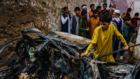 Китай призывает "расплатиться" с злодеяниями США в Афганистане - RT World News