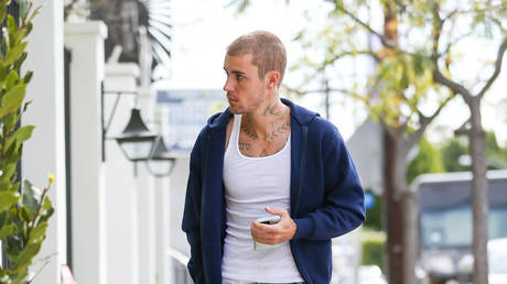 Justin Bieber uses bombed Gaza image in request to pray for Israel — RT Games & Culture