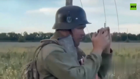 Ukrainian troops in Nazi helmets taunt Russian pensioner (VIDEO) — RT Russia & Former Soviet Union