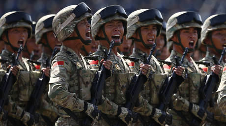 Китайские государственные СМИ заявляют, что Пекин готов применить силу против США