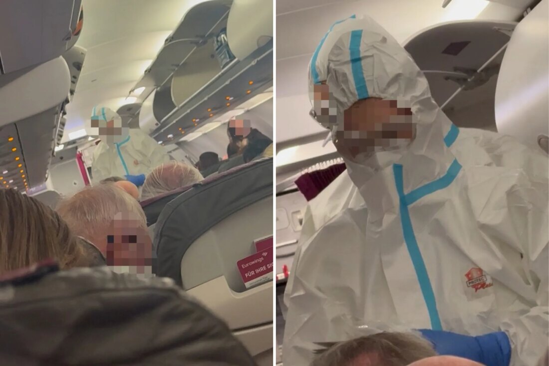 Медики в защитных костюмах поднялись на борт самолёта в Дюссельдорфе после вспышки предполагаемого норовируса