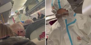 Медики в защитных костюмах поднялись на борт самолёта в Дюссельдорфе после вспышки предполагаемого норовируса