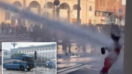 Женщина в красном и водомёт: как протесты в Италии переросли в насилие